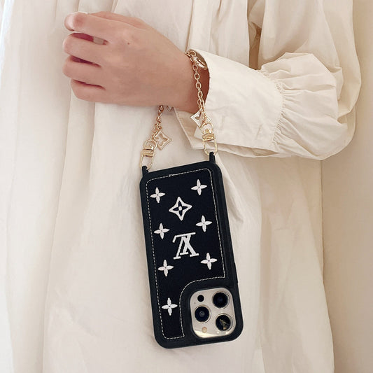 Embroidered leather iPhone case with chain